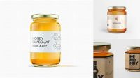 2312+ Clear Glass Honey Jar in Paperboard Sleeve PSD Mockup Half Side View High-Angle Shot Digital Photoshop Free Mockup