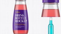 3319+ 330ml Clear Glass Bottle with Pink Drink PSD Mockup Free Design Resource