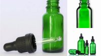 774+ Green Glass Dropper Bottle & Box PSD Mockup Creative High-Resolution PSD Freebie