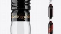 9991+ Clear Glass Dark Syrup Bottle PSD Mockup Editable Photoshop Template Freebie